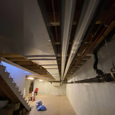 Basement renovation during demolition process, right side view