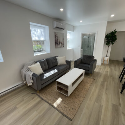 Lifted basement renovation final view of seating area